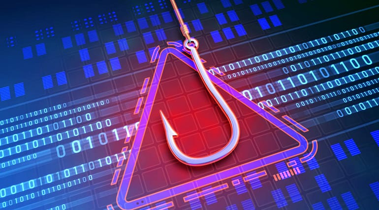 What is a phishing attack and how can employees protect themselves from this threat?